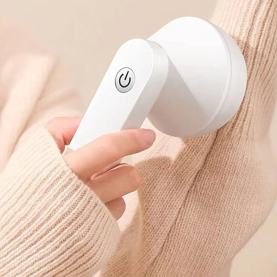 Aparat electric pentru curatat scame