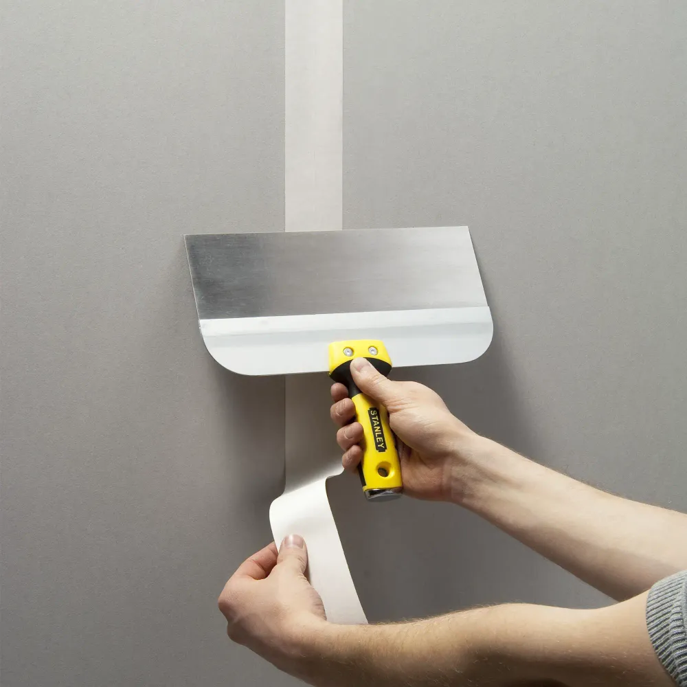 Spatulă lată pentru bandă adezivă Stanley STHT0-05771